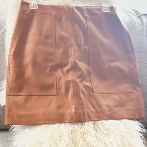 New and unworn faux leather shirt!